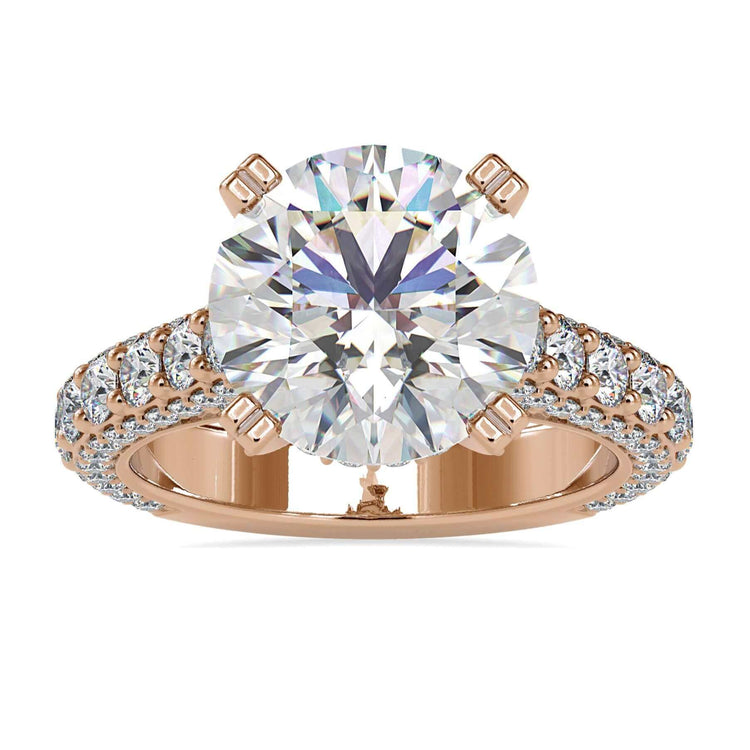 Cathedral engagement ring with a hidden halo setting and tab prongs.
