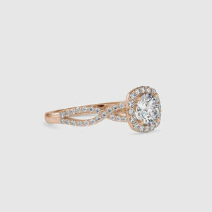 Twisted diamond ring featuring a round pave diamond design.
