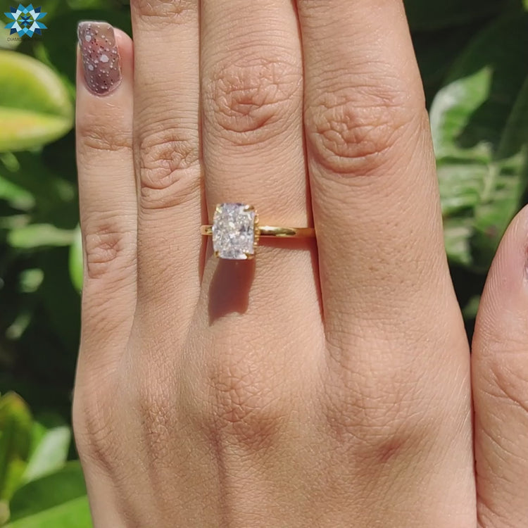 An elegant elongated cushion ring featuring a sleek and timeless style.