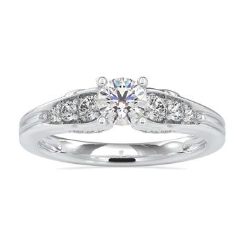 Circle Diamond Engagement Ring with a four prong setting and side stones.
