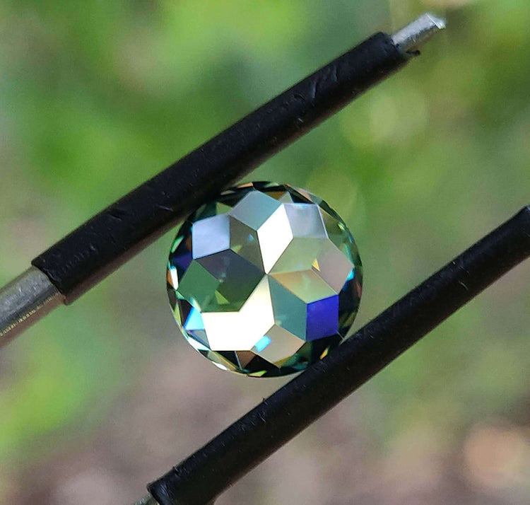 Rose cut moissanite shown in aqua green color as a 2 carat moissanite from Diamondresnu Rose Cut Moissanite collection.
