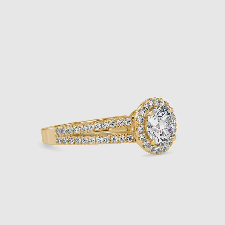 Diamondrensu ring with a split shank and a halo round diamond in an IGI certified setting.