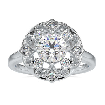 Art deco engagement ring with intricate artisan design and round diamond
