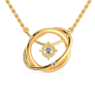 Gold diamond pendant with round cut diamond set in a handmade jewelry design.
