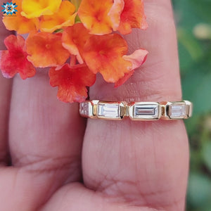 Bezel set wedding band with a sleek and secure finish.