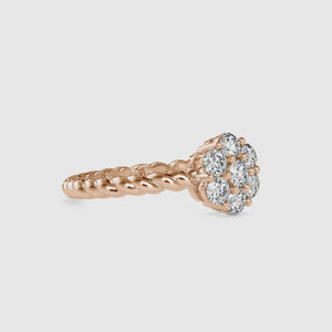Twisted engagement ring featuring a 2 carat round diamond center
