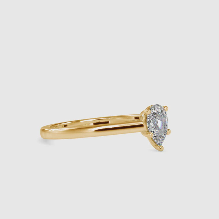 Pear solitaire ring in a five prong setting, crafted by DiamondRensu for elegant occasions.
