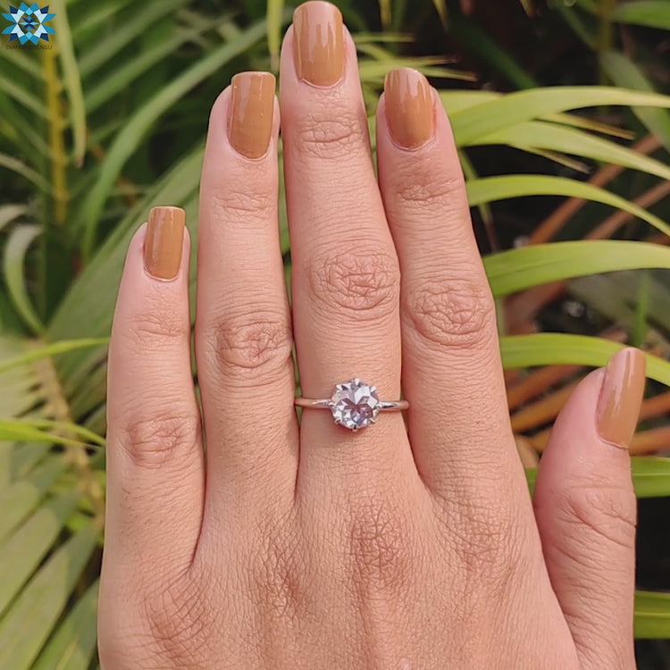 Elegant claw prong engagement ring handcrafted for brilliance.
