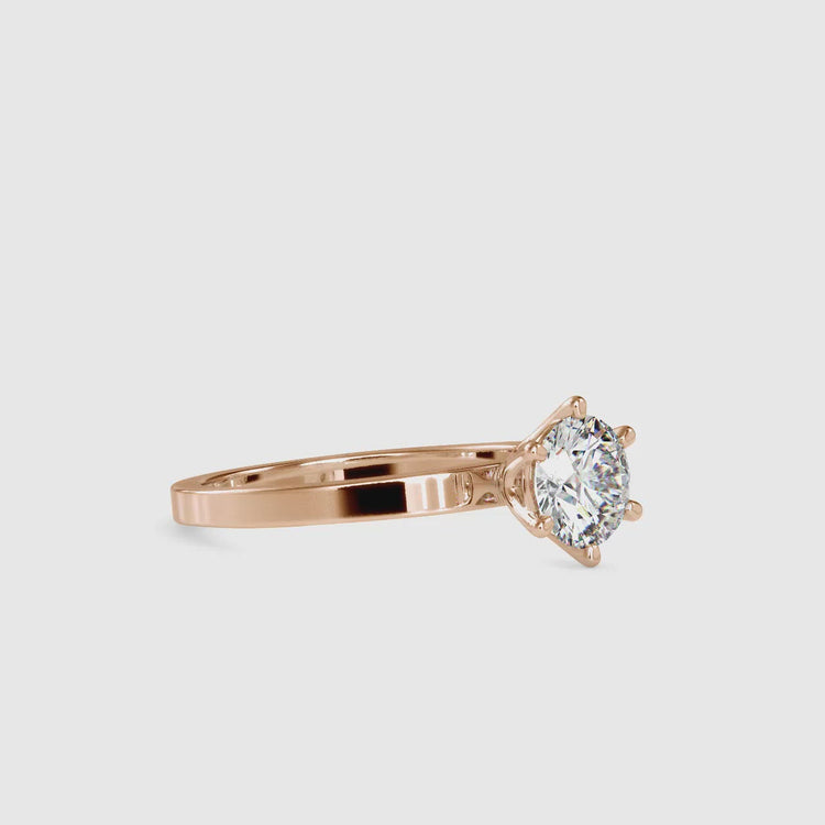 Handmade ring with a round brilliant engagement ring design and a solitaire round cut ring.