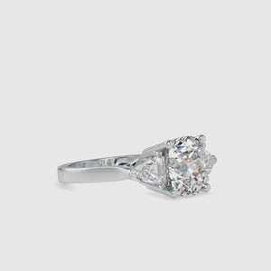 Cushion cut diamond ring with prong setting in white gold band
