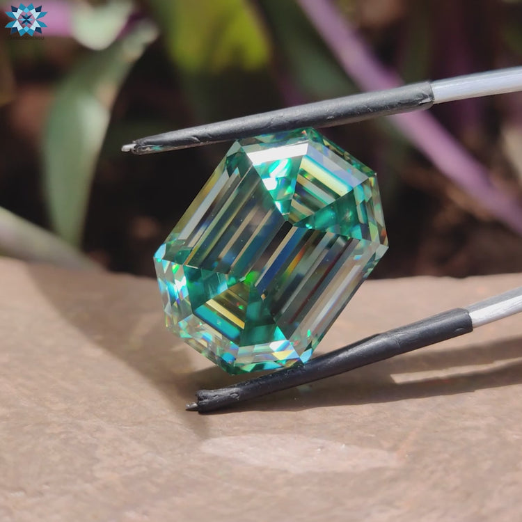 Moissanite loose stone shaped as emerald cut moissanite and 26 carat moissanite.
