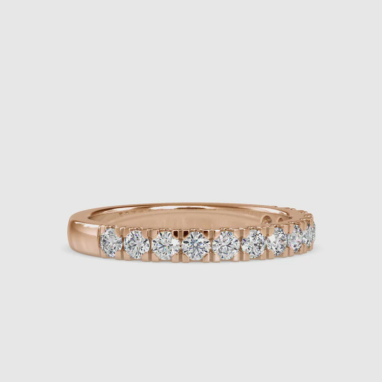 Pave band wedding ring with diamond half eternity band in white gold.
