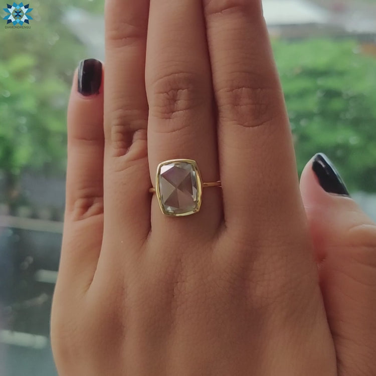 A sleek cushion cut ring showcasing a modern and sophisticated design for special moments.