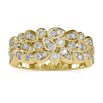 Unique wedding band featuring a bezel set pear diamond in a brilliant cut design.
