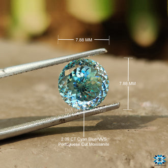 Moissanite loose stone displayed in round Portuguese style.

