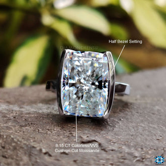 Half bezel solitaire engagement ring made with precision.