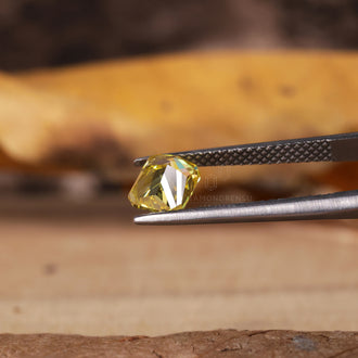 Radiant cut yellow diamond IGI certified.
