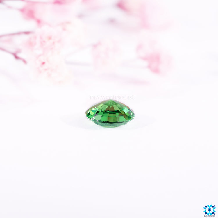 Tsavorite gemstone paired with green gemstone shine.
