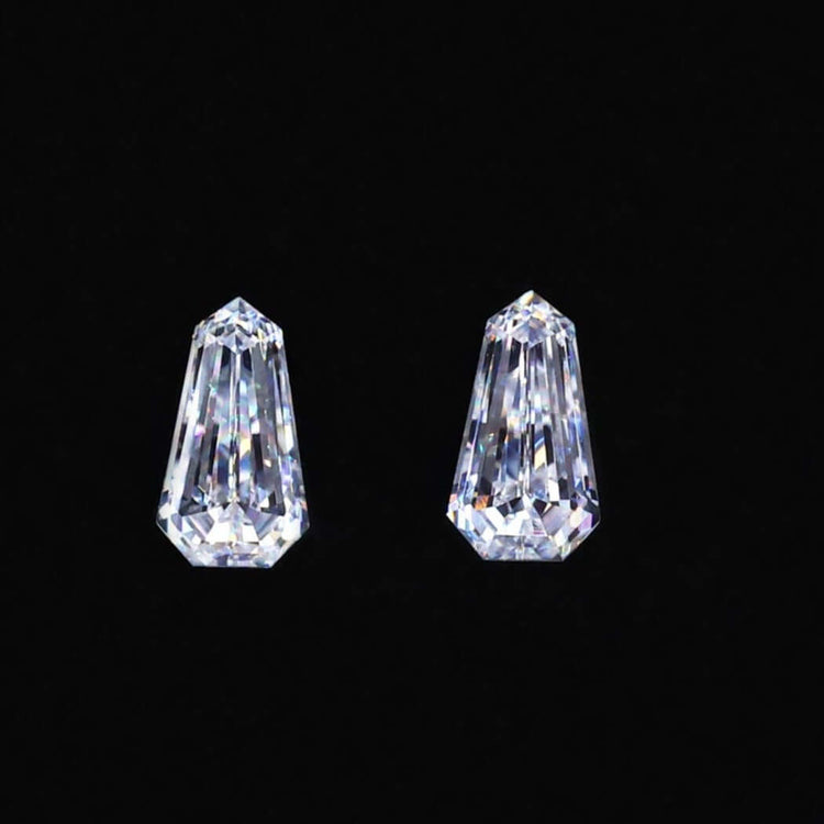 Moissanite Stones available in shield shape moissanite as a Pair Of Stones.
