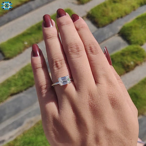 Moissanite engagement ring showcasing a stunning solitaire emerald cut.

