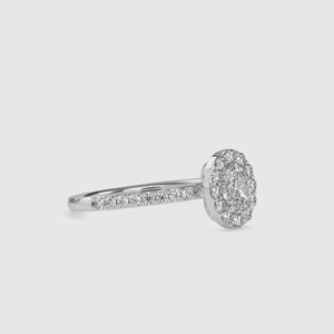 Pave diamond engagement ring with a 2 carat oval halo and a matching pave wedding band.
