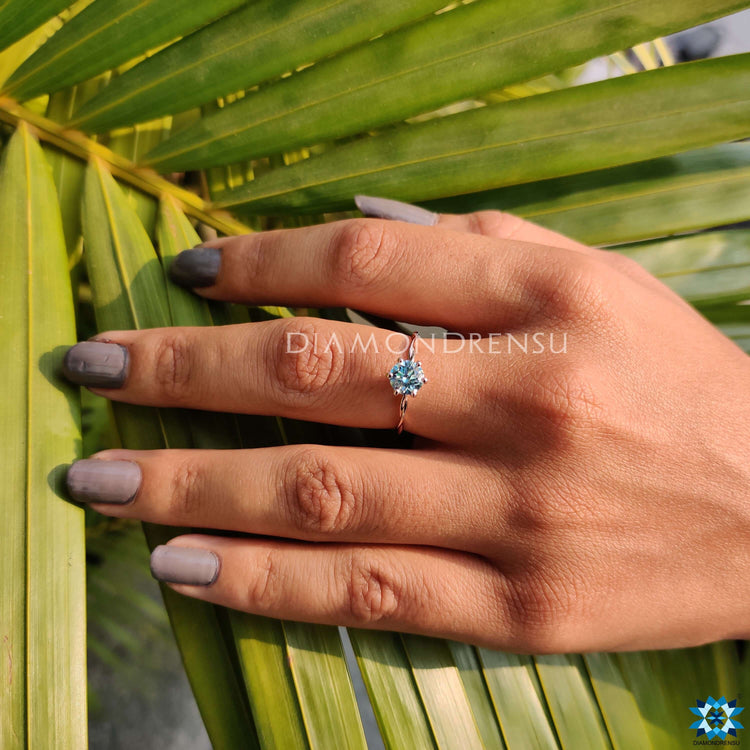 Round moissanite engagement ring perfect for a stunning proposal moment.