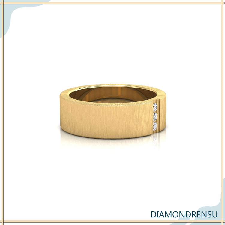 Rose gold wedding band with three stone diamond accents.
