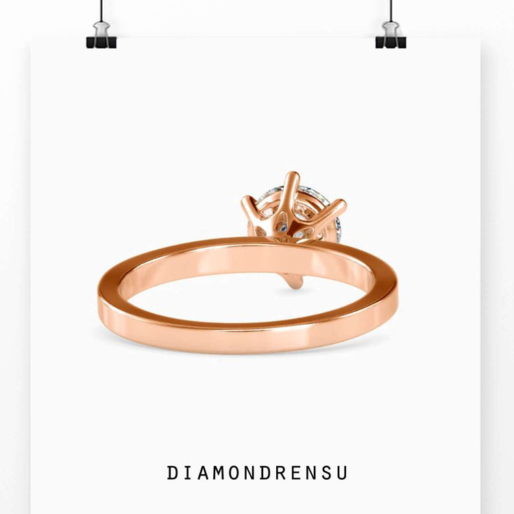 Handmade round solitaire ring with a 6 prong setting, crafted by DiamondRensu.