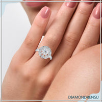 Art deco diamond ring featuring a 2 carat round diamond in prong setting
