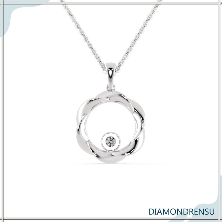 The minimalist pendant offers simple, classic beauty.
