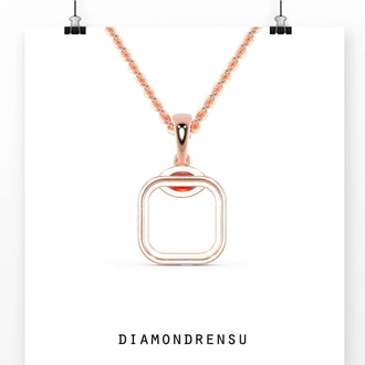 The gold pendant bail adds a polished, refined finish.
