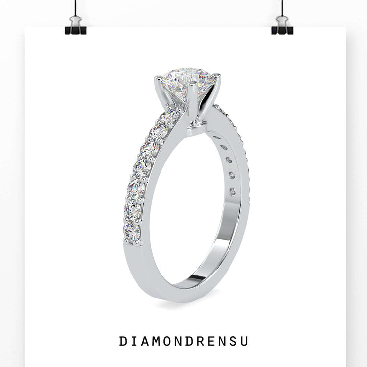 Elegant pave ring diamond set in shared prong setting.