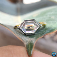 Hexagon bezel ring featuring minimalist beauty with a secure setting.
