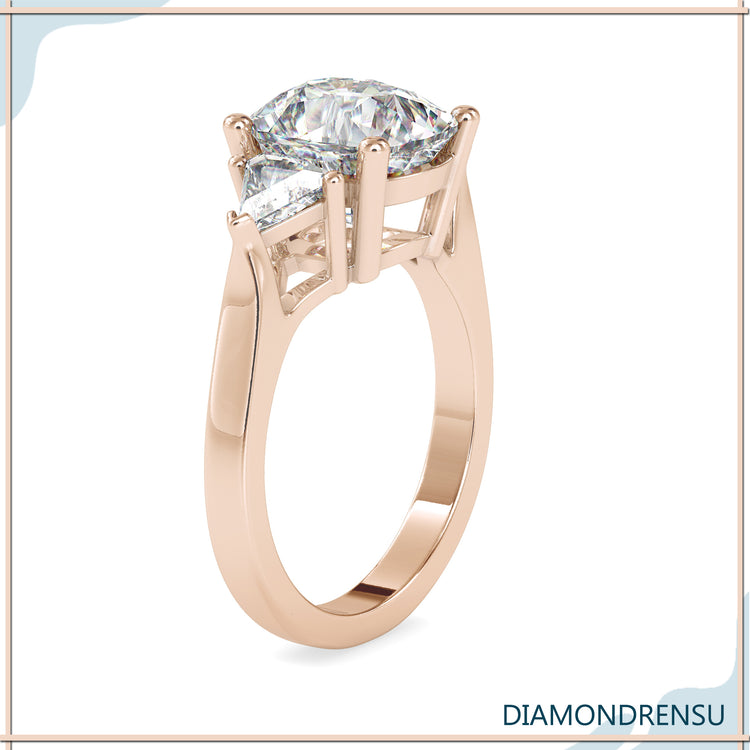 Diamondrensu ring with cushion cut diamond in a 4 prong setting
