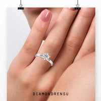 6 prong engagement ring with a round brilliant cut diamond, perfect for timeless elegance.