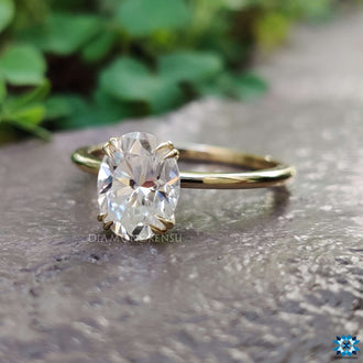 Oval solitaire engagement ring radiating charm and grace
