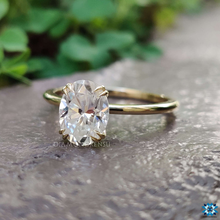 Oval solitaire engagement ring radiating charm and grace
