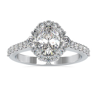 Oval diamond engagement ring with pave setting in white gold
