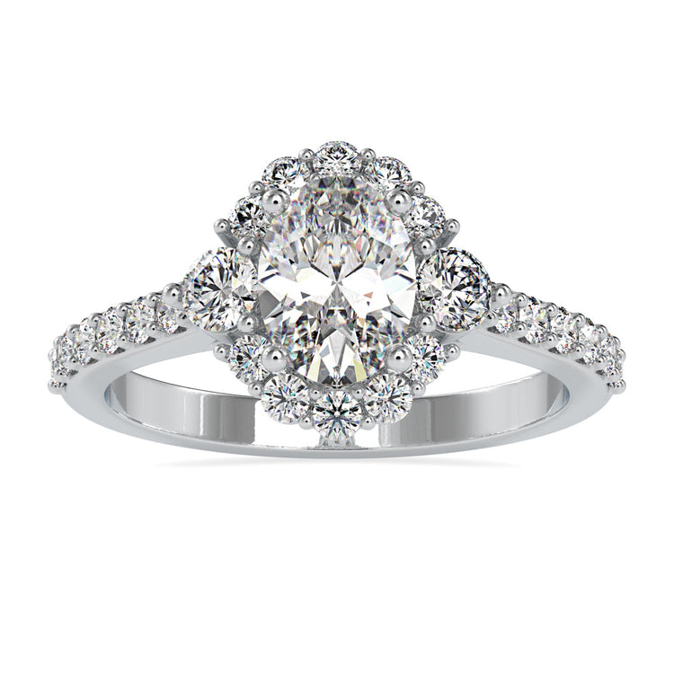 Oval diamond engagement ring with pave setting in white gold
