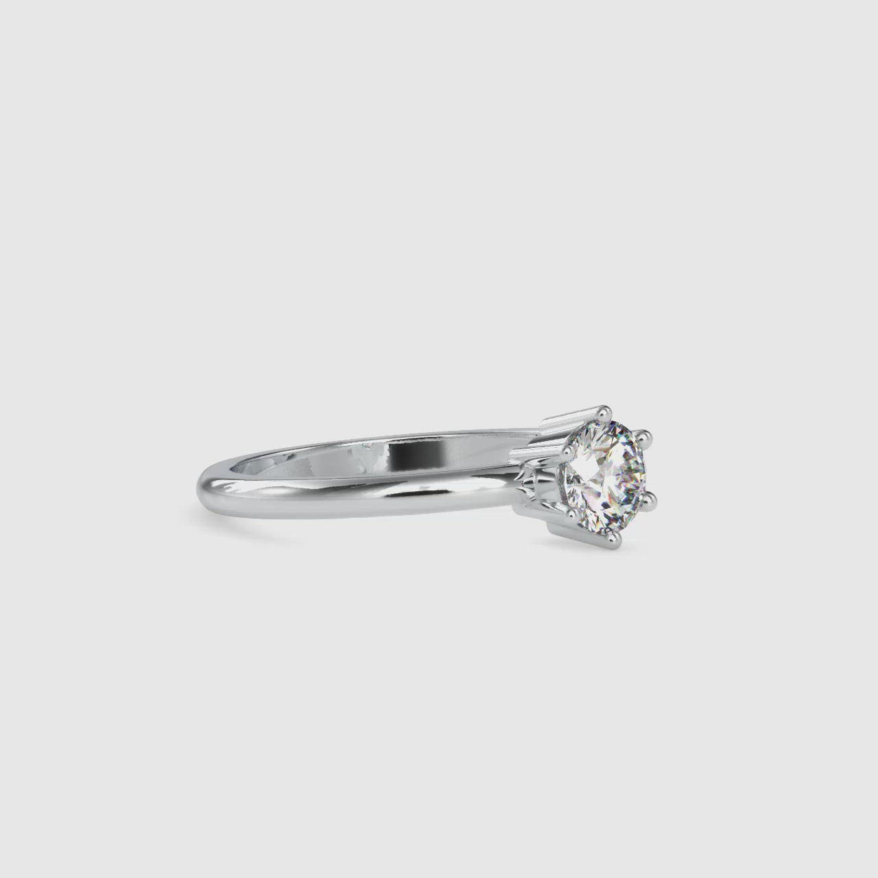 Stunning six prong round engagement ring with a lab grown diamond.