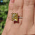 moissanite jewelry - diamondrensuRadiant Cut Yellow Moissanite Ring on Model Hand