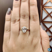 Moissanite rings oval design showcasing refined beauty.
