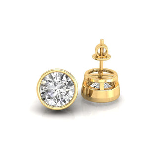 Round diamond earrings with a bezel setting, crafted with attention to detail and quality.
