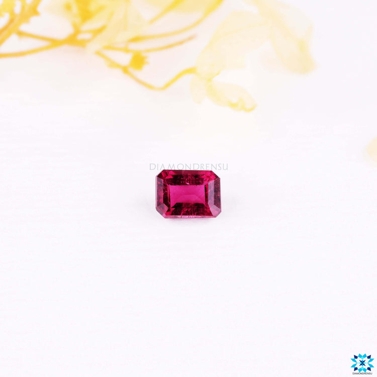Emerald cut tourmaline gemstone in pink color.
