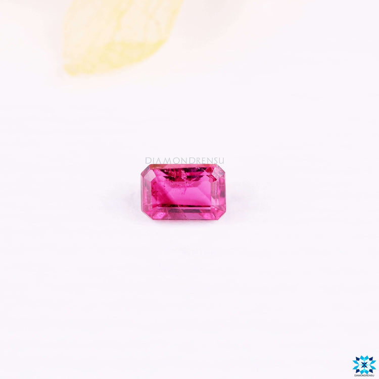 0.90 carat gemstone featuring emerald cut tourmaline.
