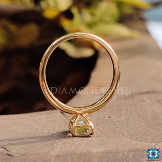 Moissanite emerald cut paired with a sleek, modern band.
