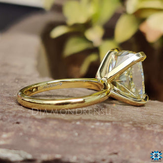 Solitaire cushion cut engagement ring for a sophisticated and timeless look.
