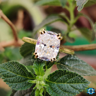 Radiant moissanite elongated cushion in solitaire style.