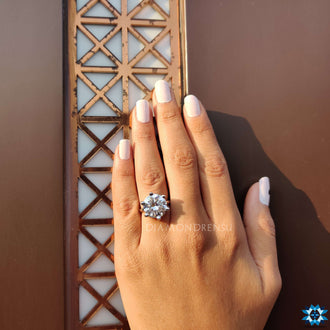 Round solitaire engagement ring handcrafted with care.
