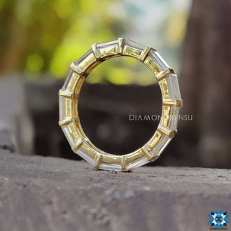 Handmade baguette moissanite band in a classic design.